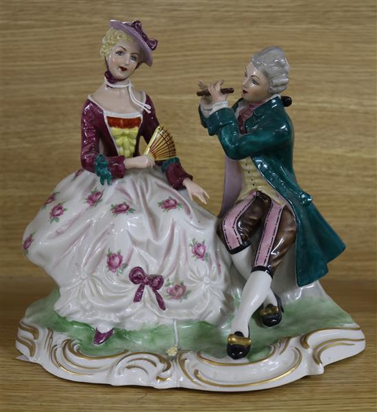 A Continental porcelain group of a lady and gallante, 25cm, (a.f.)